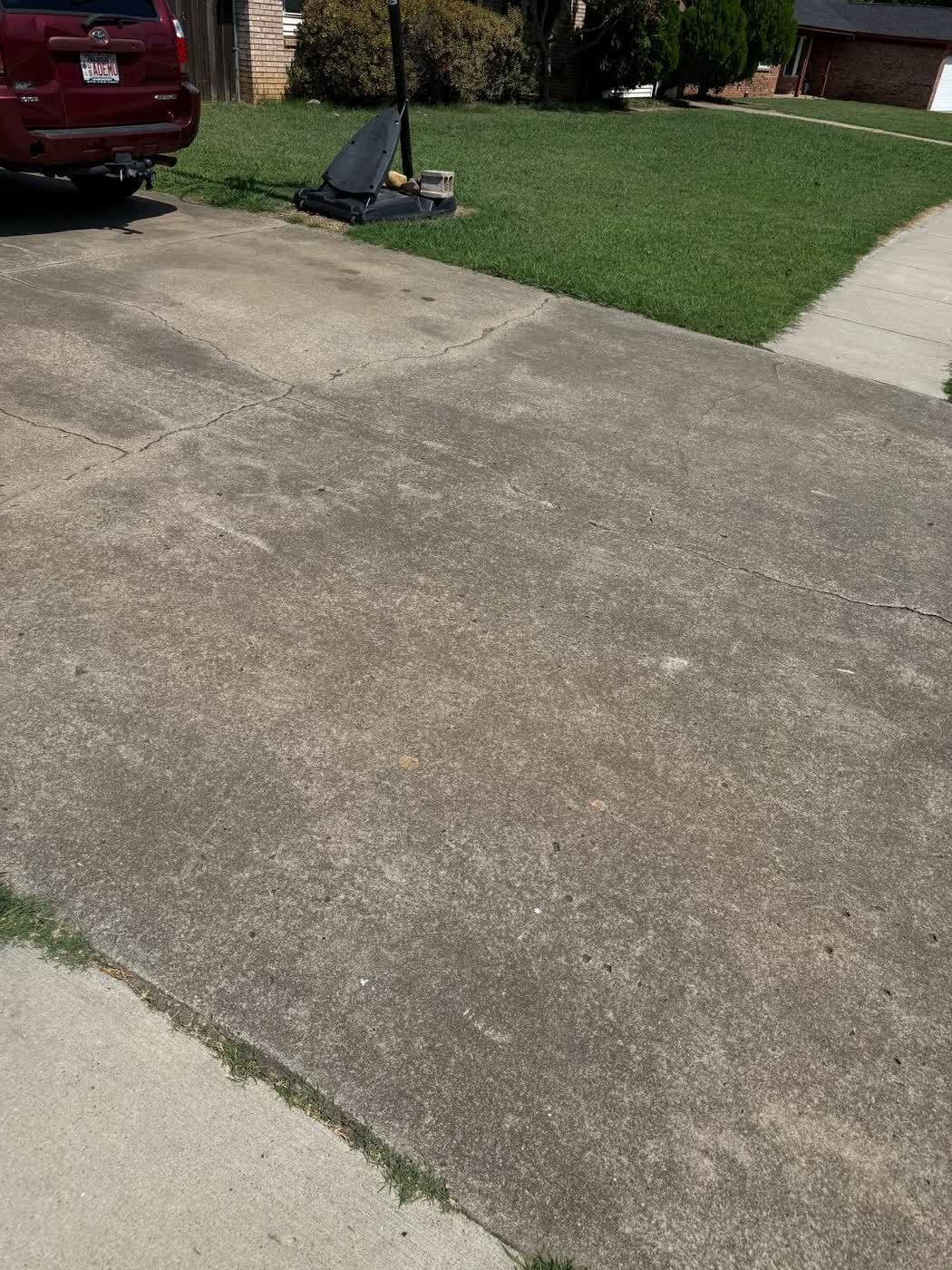 Stained Fort Smith driveway before pressure washing